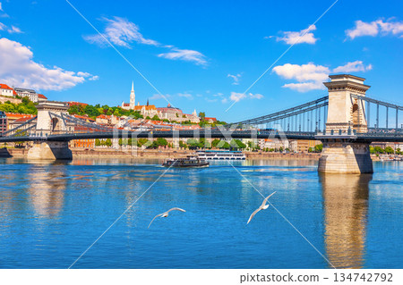 Famous Chain Bridge with Matthias Church at sunny day, Budapest, Hungary 134742792
