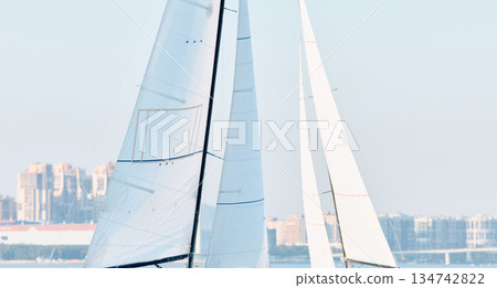 multiple sails at the sailing regatta in the Gulf of Finland, hot race of several yachts, nobody multiple sails at the sailing regatta in the Gulf of Finland, hot race of several yachts, nobody 134742822