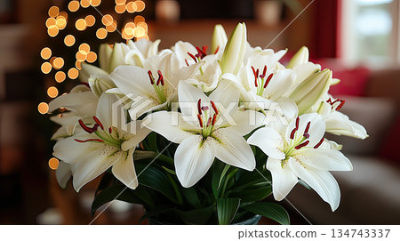 Concept of mourning. White lily flowers on dark background. Mourning or funeral background. White amaryllis flowers arranged in line on soft blue background. 134743337