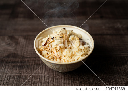 Cooked rice on a wooden table Cooked rice on a wooden table 134743889