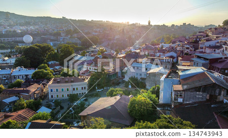Aerial view on old town of Tbilisi and Tower of University Aerial view on old town of Tbilisi and Tower of University 134743943