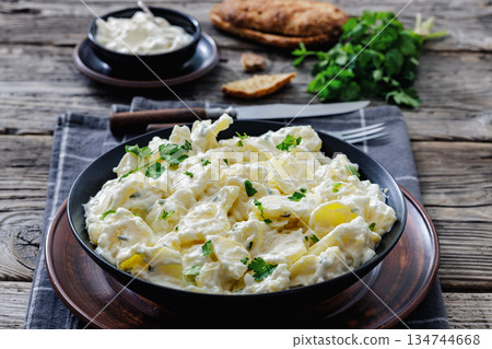 German potato salad in a bowl, close-up German potato salad in a bowl, close-up 134744668