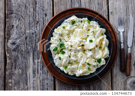 German potato salad in a bowl, top view 134744673