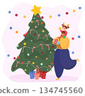 Father and daughter decorate the Christmas tree 134745560