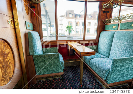 Retro interior and green seats of the Golden Pass Belle Epoque train, Montreux, Vaud, Switzerland 134745878