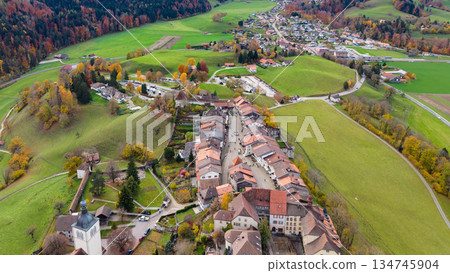 Aerial view of Gruyères showing the layout of the medieval town's rooftops and streets. Gruyères, canton of Fribourg, Switzerland 134745904