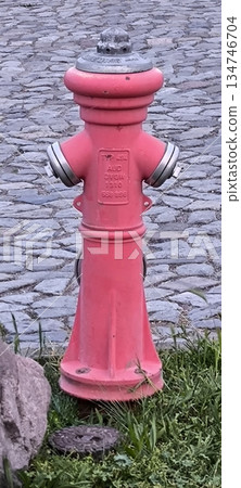 Red Fire Hydrant: A Symbol of Safety in the Urban Environment 134746704