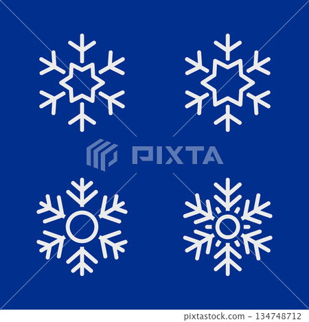 Four white snowflake icons on blue background. Elegant winter vector illustrations for festive Christmas digital artwork 134748712