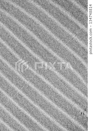 Intricate patterns form in the sand Intricate patterns form in the sand 134748814