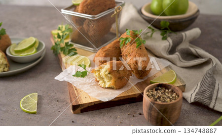 Cod dumplings or bolinhos de bacalhau Cod dumplings or bolinhos de bacalhau 134748887