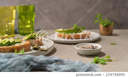 Toast with avocado cream cheese and wheat bread Toast with avocado cream cheese and wheat bread 134748945