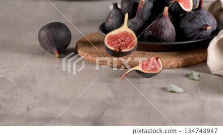 A few figs in a plate A few figs in a plate 134748947