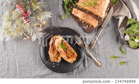 Puff pastry vegetable roll 134748998