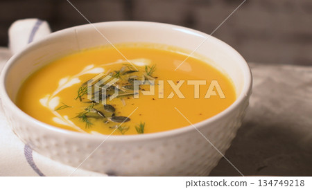 Homemade pumpkin soup Homemade pumpkin soup 134749218