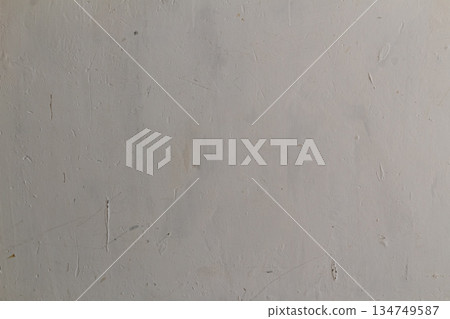 Texture of Old Whitewashed Wall with Scratches and Marks, for Backgrounds and Creative Design Projects 134749587