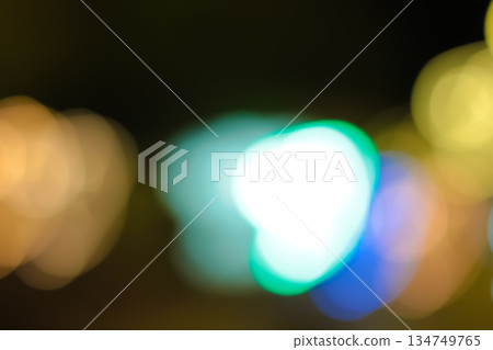 Blurred Lights in Motion with Bokeh Effect, Slow Shutter Speed Creating Abstract Light Trails for Nightlife and Urban Energy 134749765