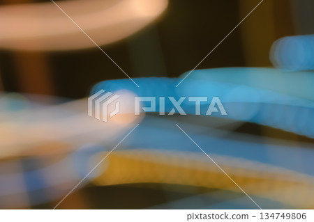 Abstract Blurred Motion with Slow Shutter Speed, Blue and Yellow Streaks for Dynamic Energy and Creative Backgrounds Abstract Blurred Motion with Slow Shutter Speed, Blue and Yellow Streaks for Dynamic Energy and Creative Backgrounds 134749806