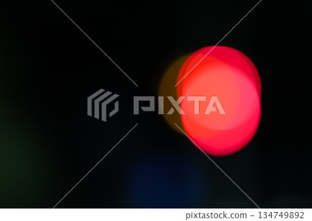 Abstract Red Bokeh Light Effect on Black Background, creating a visually appealing and modern design element for creative projects Abstract Red Bokeh Light Effect on Black Background, creating a visually appealing and modern design element for creative projects 134749892
