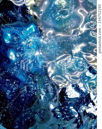 A fantastic abstract texture of blue fluid and bubbles mixing together A fantastic abstract texture of blue fluid and bubbles mixing together 134752293