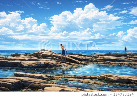 岩石海岸與夏日天空 夏日的天空和在岩石上玩耍的景色 134753154