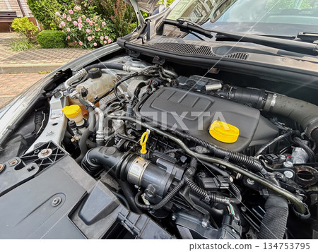 A Detailed View of a Contemporary Automotive Engine Compartment Showcasing Its Efficient Design and HighQuality Components That Contribute to Enhanced Performance and Improved Functionality 134753795