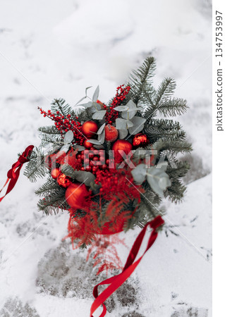 Discover an Elegant Winter Bouquet featuring stunning Red Accents and lush Frosty Greens, making it the ideal choice for your Holiday Celebrations and all sorts of Festive Occasions throughout winter Discover an Elegant Winter Bouquet featuring stunning Red Accents and lush Frosty Greens, making it the ideal choice for your Holiday Celebrations and all sorts of Festive Occasions throughout winter 134753997