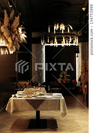 Experience an elegant and sophisticated dining occasion filled with chic decor and gourmet culinary delights, all set within a contemporary and inviting restaurant atmosphere that is truly memorable Experience an elegant and sophisticated dining occasion filled with chic decor and gourmet culinary delights, all set within a contemporary and inviting restaurant atmosphere that is truly memorable 134753999