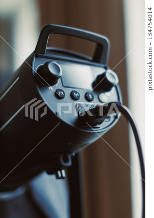 Discover our advanced professional lighting equipment featuring intuitive control knobs and reliable cable connections, designed specifically for both photography and filmmaking applications 134754014