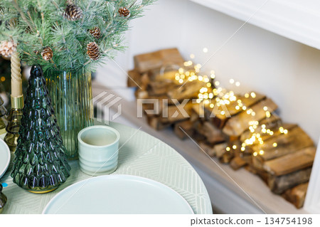 This holiday season, enjoy a Cozy Dining Experience with a lovely Holiday Atmosphere and Festive Decorations, creating a Warm Ambiance to bring everyone together during this special time 134754198