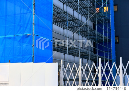 External scaffolding for construction work External scaffolding for construction work 134754448