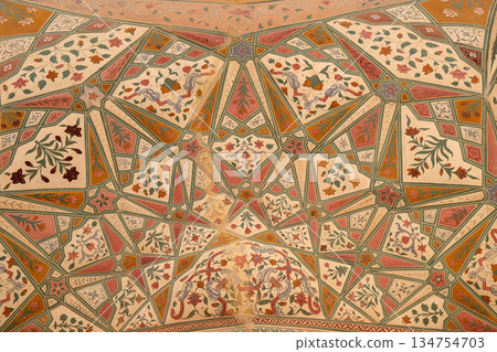 Beautiful ornament on wall of palace in Amber Fort in Jaipur, Rajasthan, India Beautiful ornament on wall of palace in Amber Fort in Jaipur, Rajasthan, India 134754703