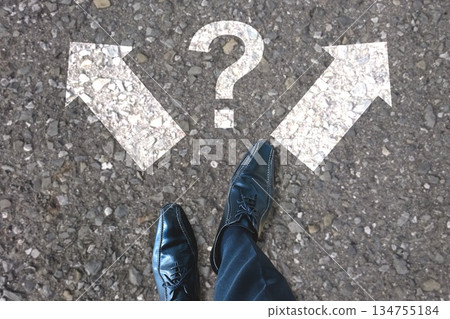 The feet of a man unsure of his future options The feet of a man unsure of his future options 134755184