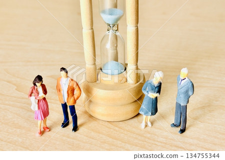 Hourglass and young people and senior Hourglass and young people and senior 134755344