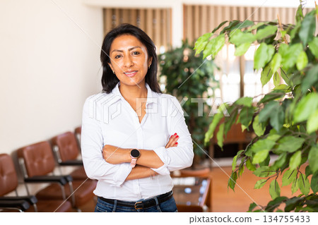 Portrait of successful latino american business woman Portrait of successful latino american business woman 134755433