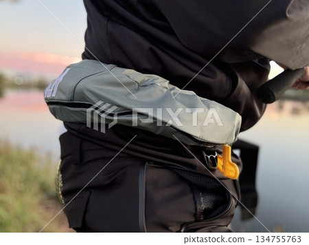 Fishing, waterside, life jacket, safety 134755763