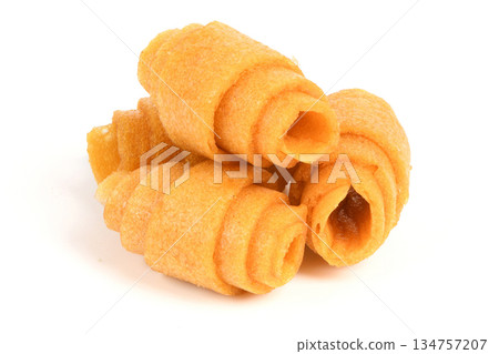 Bright Yellow Fruit Leather Rolls Isolated on White Background Bright Yellow Fruit Leather Rolls Isolated on White Background 134757207
