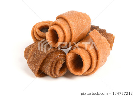 Brown Cinnamon Apple Fruit Leather Rolls Pile Brown Cinnamon Apple Fruit Leather Rolls Pile 134757212