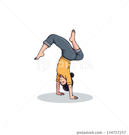 A focused person practicing handstand yoga pose for balance, strength and wellness lifestyle on 134757257