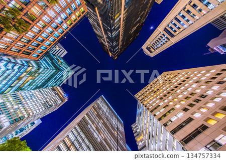 The cityscape of Tokyo in Japan is heading towards a glittering era. The Otemachi office district is shining brightly despite it being the end of the work year. Towards a new era = December 26th 134757334