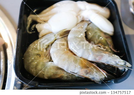 raw prawn, raw shrimp or fresh shrimp and squid raw prawn, raw shrimp or fresh shrimp and squid 134757517