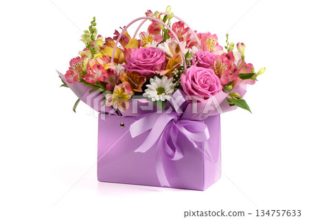 A bouquet and a violet bag with handles white background. Bouquet of flowers, chrysanthemum, rose, lily, carnation. 134757633