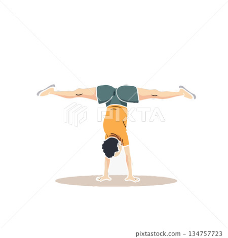 Handstand acrobatic balance requires strength and coordination a person performing acrobatics 134757723