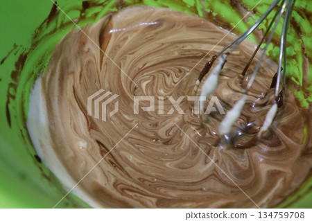 Mixing chocolate dough with a whisk and marbled confectionery process 134759708