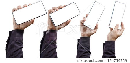 Hands holding blank screen smartphones in various orientations for mockup display. Isolated Background. Phone Mockup. Business Concept. High quality photo 134759739