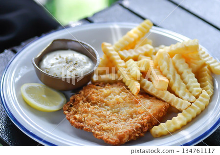 fish and chip or fried fish with French fries and dip 134761117