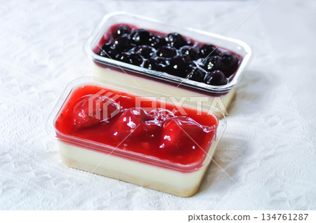 strawberry cheese cake , strawberry cheese pie or strawberry cheesecake and blueberry cheesecake in the box strawberry cheese cake , strawberry cheese pie or strawberry cheesecake and blueberry cheesecake in the box 134761287