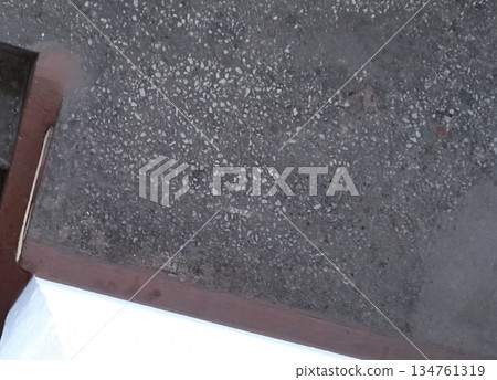 A high-resolution image of a worn terrazzo surface featuring metal trim. Perfect for industrial textures, backgrounds, and overlays in creative projects. Versatile for various design applications. A high-resolution image of a worn terrazzo surface featuring metal trim. Perfect for industrial textures, backgrounds, and overlays in creative projects. Versatile for various design applications. 134761319