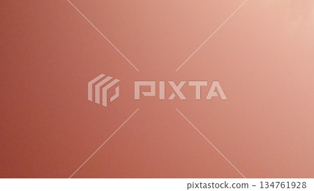 A soft, gradient salmon background featuring warm tones enhances visual appeal. Ideal for graphic designs, websites, and text placements, adding depth and creativity to projects. 134761928