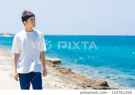Men watching the sea Men watching the sea 134762268