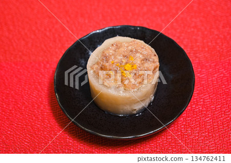 Yuzu-scented steamed radish with meat and miso sauce Yuzu-scented steamed radish with meat and miso sauce 134762411